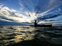 Kayaking under a beautiful sunset