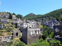 Kayaky the ancient Greek ghost town in Turkey Thousands of identical houses sprawling across the hill side Its been uninhabited since  after the Greco-Turkish war ended in 