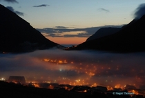 Klaksvk covered by a thin layer of fog at - in the morning Faroe Islands 