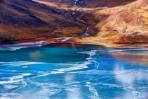Lakeside at Tibet - a frozen Yangzhuoyongcuo Lake Tibet  photo by Haiwei Hu
