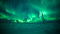 Lapland in Finland lighted up by Aurora Borealis 