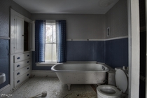 Large Bathroom with a Beauty Claw Foot Tub Inside a Massive Abandoned House in Nova Scotia 