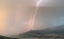 Lightening and Rainbow over the Jordanelle Reservoir Utah 