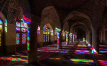 Lighting reflected through the stained glass windows inside the Nasir-al-Molk mosque of Iran 
