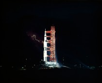Lightning dances around Apollo  on the eve of launch July   