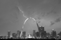Lightning over St Louis and the Gateway Arch at night black and white 