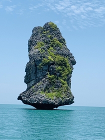 Lone rock in the sea Anthong Islands National Marine Park 