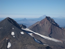 Looking north view from summit of South Sister Oregon and rest of Cascade range  by John Emmons