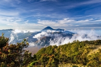 Looking out upon Mount Bromo and Mount Semeru  photo by Rivan Indra