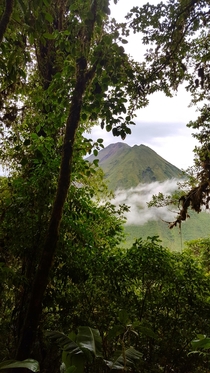 Looking up at Arenal through the rainforest and fog in Costa Rica 