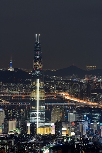 Lotte World Tower and the night lights of Seoul South Korea 
