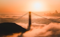 Low Fog at Golden Gate Bridge with the Bay Bridge amp San Francisco City Skyline in the back  OC  cbyeva
