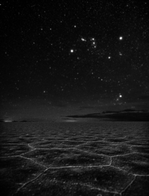Luminous night sky consists of bright familiar stars of Orion the hunter amp aldebaraneyes of Taurus the bull over Salar de Uyuni planet Earths largest salt flat Credit Stephanie Ziyi Ye