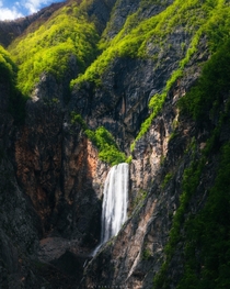 Majestic waterfall Boka in spring glory in Bovec Slovenia 