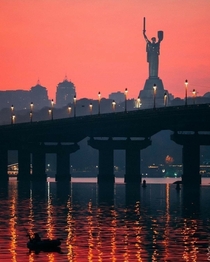 May evening in Kyiv Patons bridge across the Dnieper is in the center