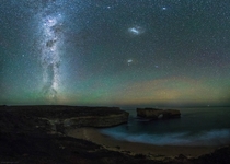 Milky Way airglow and a couple of Magellanic clouds over the London Arch Victoria Australia 
