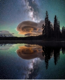 Milky Way amp lenticular cloud or UFO reflected on lake in Western Washington State by John Weatherby