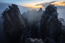Mind blowing frost covered peaks at sunrise in Huangshan  bloveimages