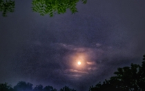 Moon Peeking out of Clouds Last Night My first try 
