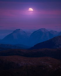 Moonrise in sunset colours from MtUlriken Norway 