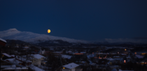 Moonrise over snowcovered mountains - Bod Norway 
