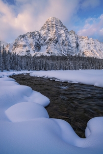 Morning light on a prominent mountain along the Icefields Parkway in Canada 