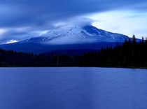 Mount Hood from a nearby lake at twilight Oregon 