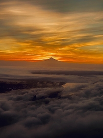 Mount Hood sunset with downtown Portland peaking through the fog below