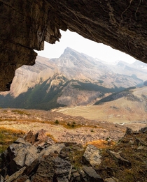 Mountain framed by a mountain shaped cave Alberta Canada  ignatureprofessor