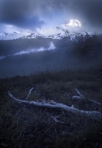 Mt Baker revealed through the fog during the last light Washington 