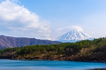 Mt Fuji in Japan towering over the surrounding mountains from Lake Saiko 