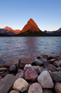 Mt Grinnell catching the first rays of sunrise Glacier National Park MT 