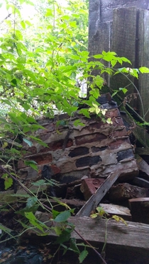 My favourite abandoned house was torn down This is all thats left Collapsed chimney and one wall