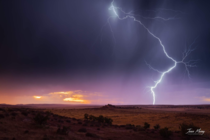 My first post A very energetic storm moving through Moab Utah at sunset Most of my lightning shots are at night so Im happy to have this one 