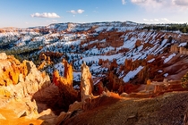 My first time visiting Bryce Canyon - the snow was stunning against the red rocks 