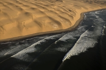 Namib Sand Sea meeting the Atlantic Ocean Namibia 