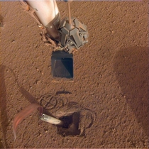 NASA Mars InSight lander pushing on the mole to enable the heat probe to take Mars temperature 