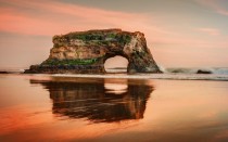 Natural arch off the coast of Santa Cruz California 