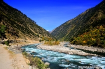 Neelum River flowing through the Neelum Valley in Azad Kashmir Pakistan  by Hassan Mohiudin