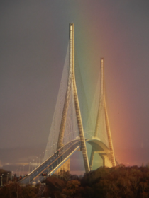 Normandy Bridge in France with a rainbow