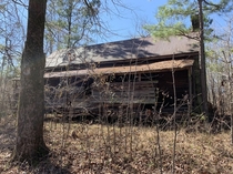 Not a very good picture but a house built in the s abandoned in the middle of nowhere in the woods near Dadeville Alabama