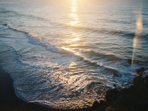 nothing sexier than a sunrise by the ocean on film drowning in sun flares 