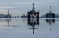 Oil drilling rigs are parked up in the Cromarty Firth near Invergordon Scotland Falling prices have reduced demand for drilling work in the North Sea and has led to the laying up of the rigs Reuters 