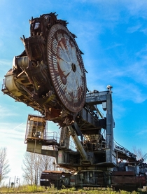 Old and giant excavator in an abandoned quary France 