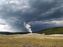 Old faithful geyser after eruption Yellowstone 