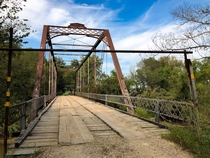 Older Infrastructure Iron Bridge with Wooden Deck southeast of Wichita KS 