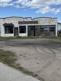 On my journey on foot across America I came by this old Truck shop still has a truck inside