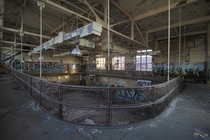 On The Running Track Inside the Gymnasium of the Abandoned Horace Mann High School 