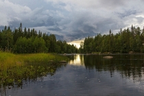 Oncoming storm over Keret river Karelia Russia 