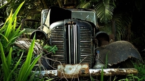 One anachronism upon another - an abandoned black London taxi near Charles Lindberghs grave in Maui Hawaii 